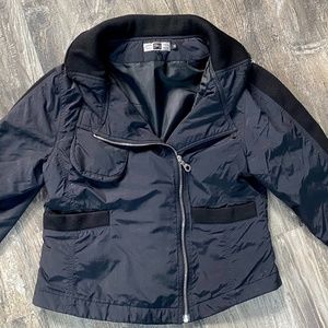 Black jacket with foldaway hood